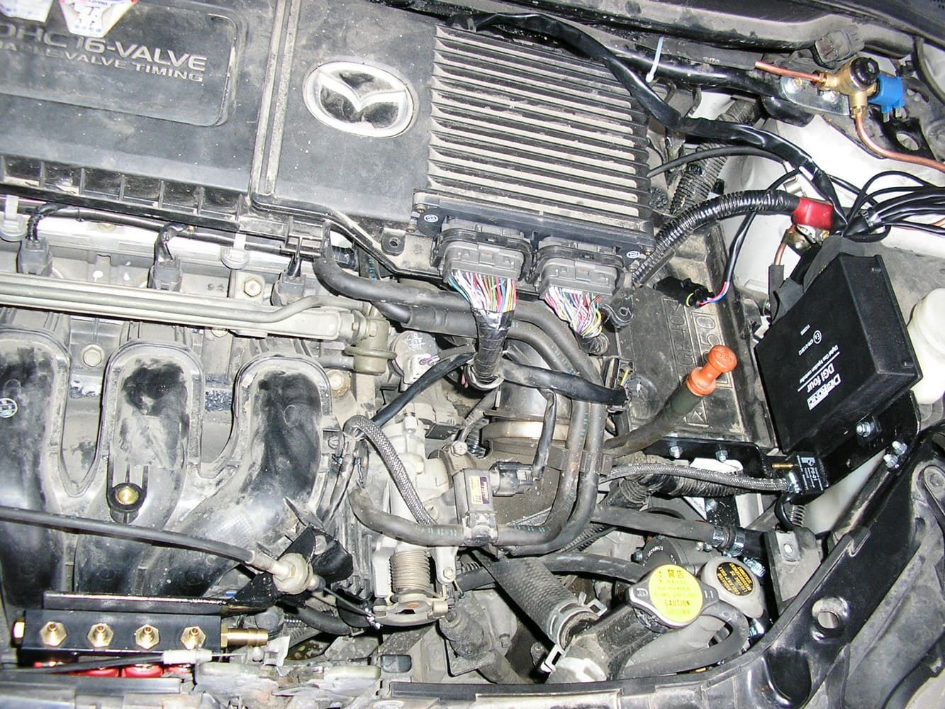 Mazda Demio 2 (DY) (2002-2007) 1.4 л.